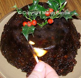 image: christmas pudding is lit